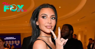Kim Kardashian Flashes Peace Sign Outside White House Event 
