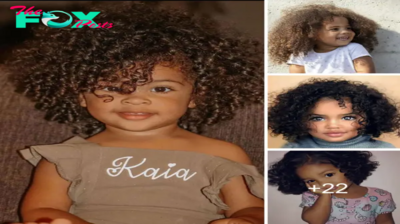 Cascades of Joy: Embracing the Sweet Innocence of Curly-Haired Infants.sena