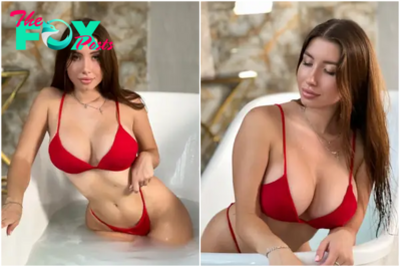 Maria Ivanova wore an attractive red swimsuit by the bathtub, making fans fascinated