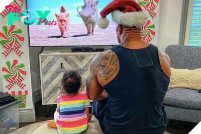 AR “The Rock” Dwayne Johnson melts hearts with his incredibly endearing photo series, showcasing the charming transition from a fierce street shark to a gentle home fish, capturing the essence of fatherhood in the most adorable way.