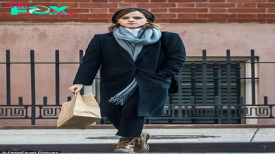 rr Emma Watson radiates effortless style as she ventures out for a shopping spree amidst the wintry streets of New York City.