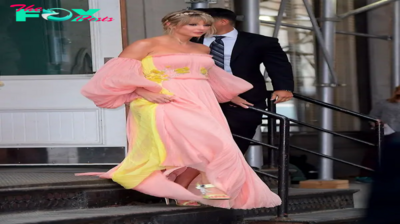 bb. “Taylor Swift Resembles a Disney Princess in Her Pink J. Mendel Gown”