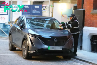 son.Pep Guardiola received his second parking ticket in as many weeks: Man City owner left his car on the yellow line for a long time.