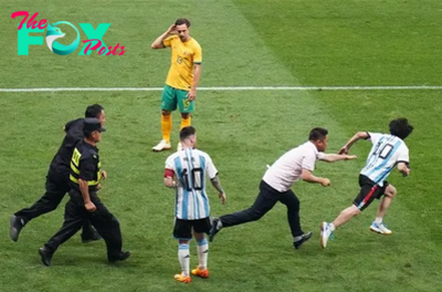 son.Chinese pitch invader arrested after hugging Lionel Messi.