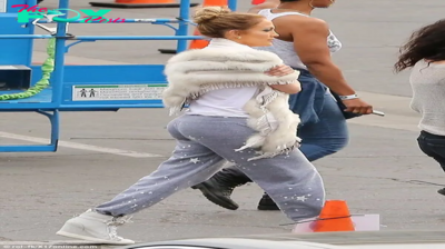 dq Might it be said that she is FUR genuine? Jennifer Lopez groups up with an enormous fluffy took as she wears warm up pants on set of American Symbol