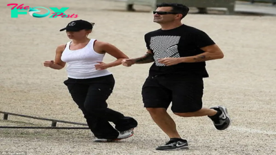 dq Keeping each other active… Scarlett Johansson and her beau Nate Naylor go for a run in Paris