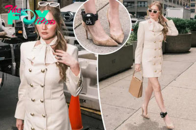 Anna Delvey ‘models’ custom designed Shao New York look, complete with bedazzled ankle monitor, for immigration hearing