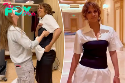 Halle Berry can’t get out of tight corset top in hilarious wardrobe malfunction