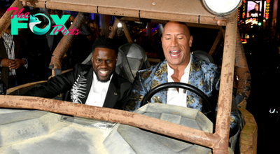 B83.Kevin Hart and Dwayne Johnson make a grand entrance in a custom car at a movie premiere.