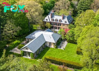 B83.In Brookline, MA, a stately mansion priced at $24.5 million boasts a storied past, an Olympic-sized pool, and a 60-foot underground tunnel.