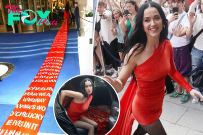 Katy Perry teases new song ‘Woman’s World’ in dress with 200-yard-long train featuring its lyrics