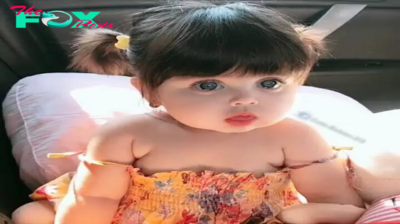 The girl is like a living doll with a plump round face, big eyes, plump mouth and lovely white and pink skin.