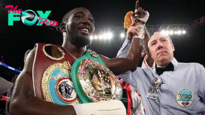 With a win over Israil Madrimov, what world titles does Terence Crawford now hold?