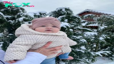 Winter wonderland and cute babies in warm clothes