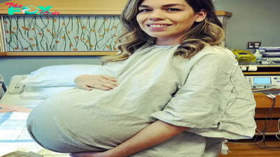 A happy mother welcomes the birth of four children after years of trying to conceive and waiting with a huge belly