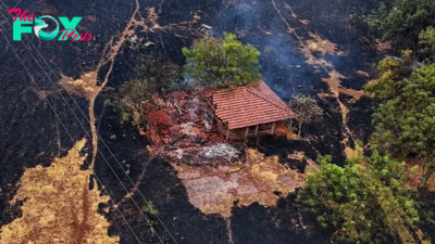 Record-breaking fires engulf South America, bringing black rain, green rivers and toxic air to the continent