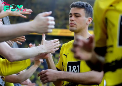 Why is Gio Reyna not playing for Borussia Dortmund against Club Brugge in the Champions League?