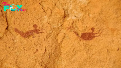 9,000-year-old rock art of people swimming in what's now the arid Sahara