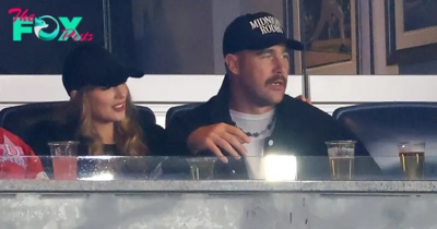 Taylor Swift Feeds Travis Kelce a Sip of Her Drink as They Show PDA at Yankees vs. Guardians Game