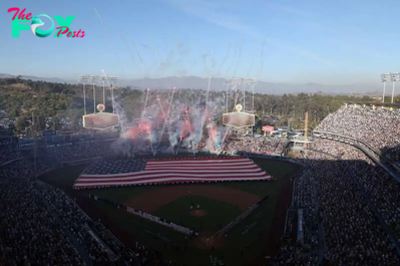 Who is singing the national anthem for game 2 of the MLB World Series?