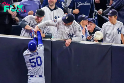 What does the MLB fan interference rule say? Is what the Yankees fans did to Mookie Betts legal?