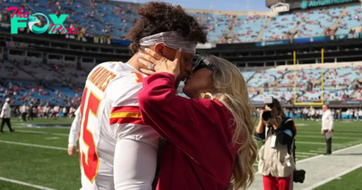 Patrick Mahomes and Pregnant Wife Brittany Share Major Sideline PDA Before Chiefs vs. Panthers Game