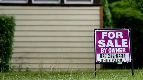 Average long-term US mortgage rates inch down this week