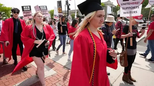 Warner CEO booed at Boston University as supporters of writers' strike picket outside