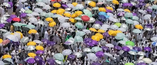 Muslims at Hajj pilgrimage brave intense heat to cast stones at pillars representing the devil