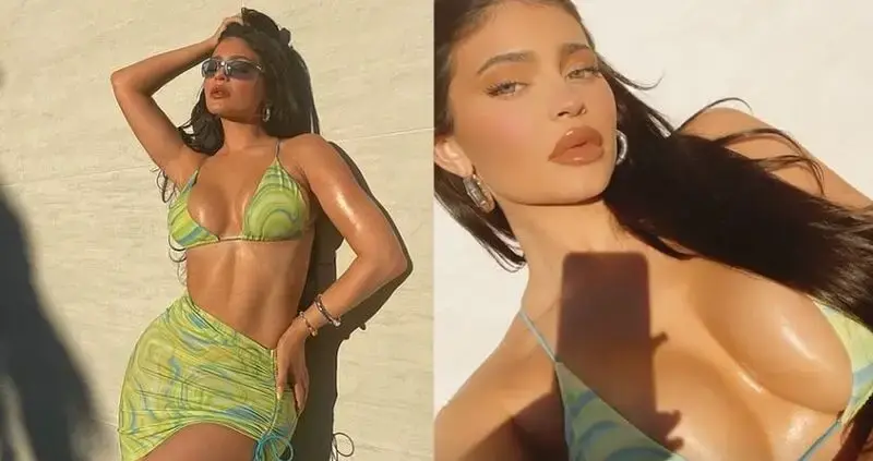Kylie Jenner showcases her toned midriff and ample cleavage in patterned green ʙικιɴι and matching cover up skirt
