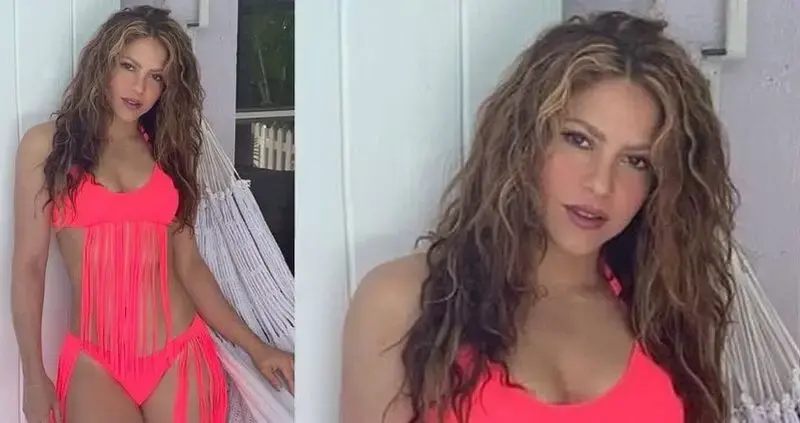 Shakira shows off the H๏τ pink ʙικιɴι she designed herself as she models fringe bathing suit for fans