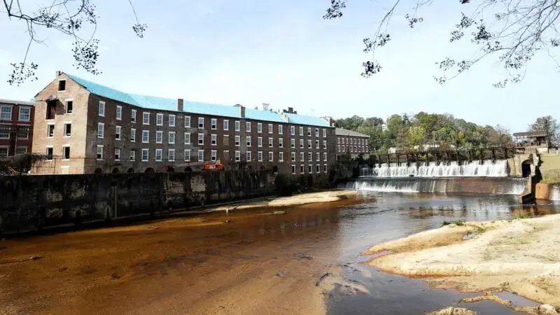 Slavery's ghost haunts cotton gin factory's transformation