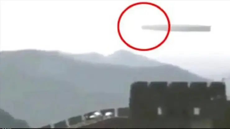 Large, Long Tubular Craft Slowly Gliding Over China’s Great Wall