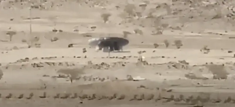 Close-up of an unidentified giant flying saucer that landed in the desert of Saudi Arabia with aliens