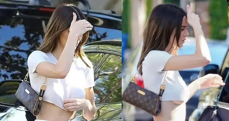 Kendall Jenner Tries To Avoid Wardrobe Malfunction By Tugging Down Tiny Crop Top In LA
