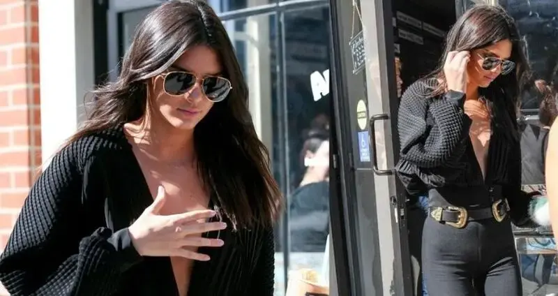 Kendall Jenner risks wardrobe malfunction in deeply plunging black top