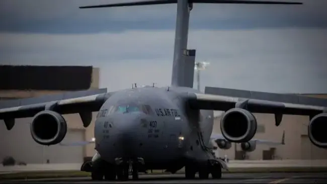 A US Mammoth C-17 plane, weighing 140 tons, is in motion as it takes off.