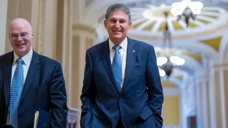 Manchin has 'no intention' of switching to be independent but suggests that could change