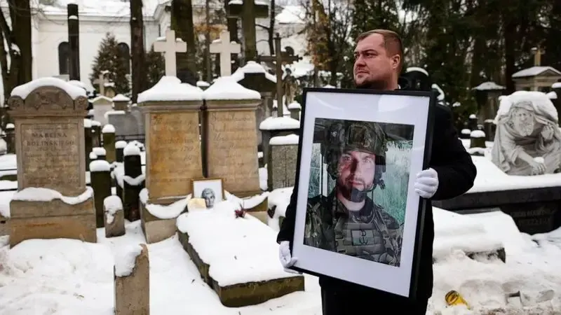 Pole killed fighting in Ukraine buried as hero of 2 nations