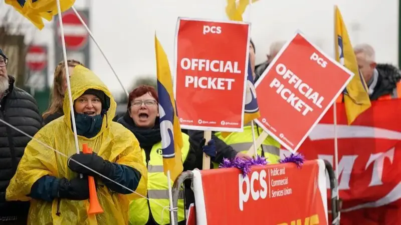 Strikes over pay disrupt Christmas travel in UK, France