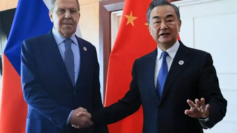 China's foreign minister signals deeper ties with Russia