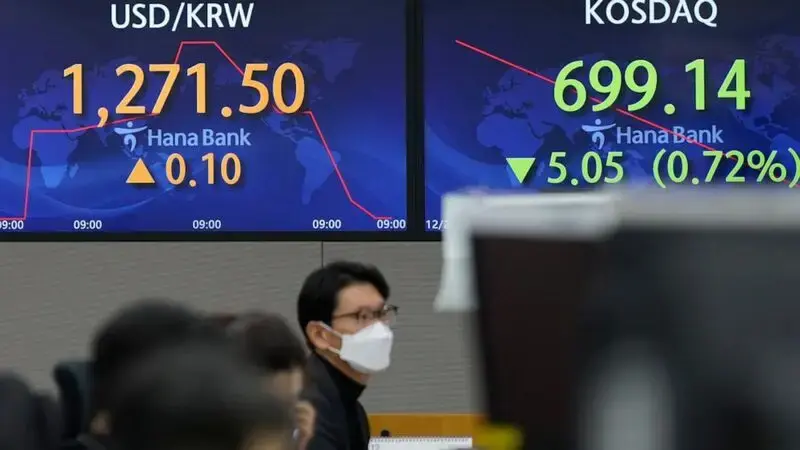 Asian shares mixed after tech-led decline on Wall Street