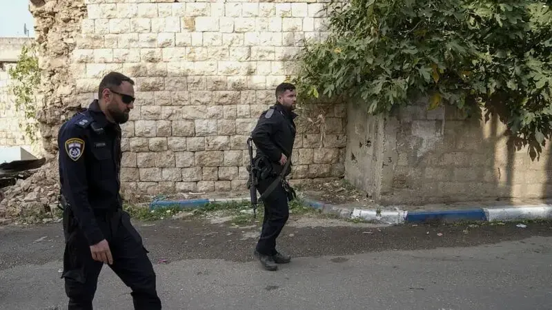 Armed Arab assailant rams car into Israeli police, shot dead