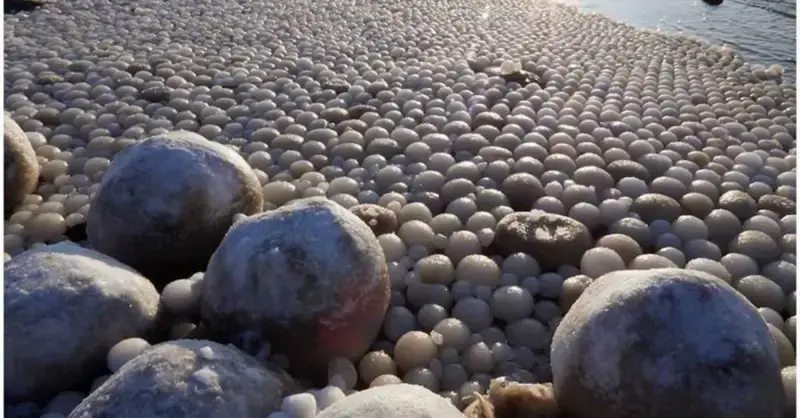 Thousands of mysterious giant ice eggs were discovered by archaeologists on a Finnish beach