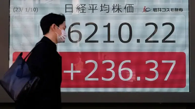 Global stock markets mixed ahead of US inflation update