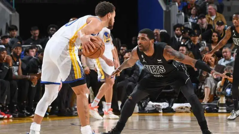Kyrie Irving locks up Stephen Curry while also recording a career-first stat line as Nets take down Warriors