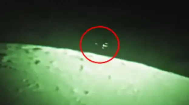 Huge alien mother ship and two smaller UFOs seen near the moon