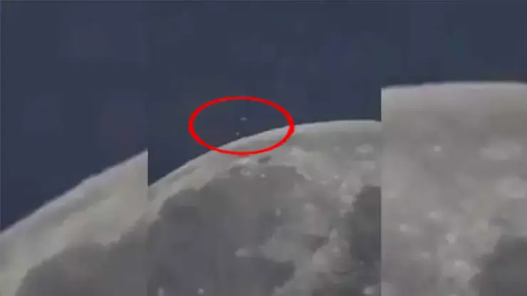 A huge UFO hovered over the moon and dropped something