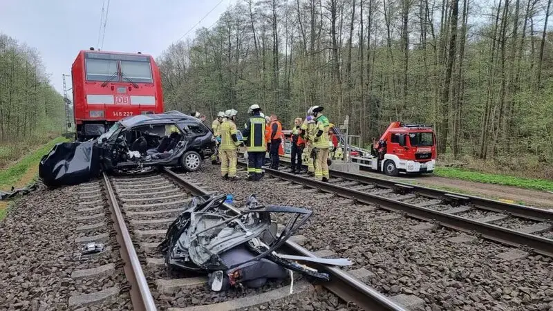 Train hits car at crossing in Germany, 3 killed