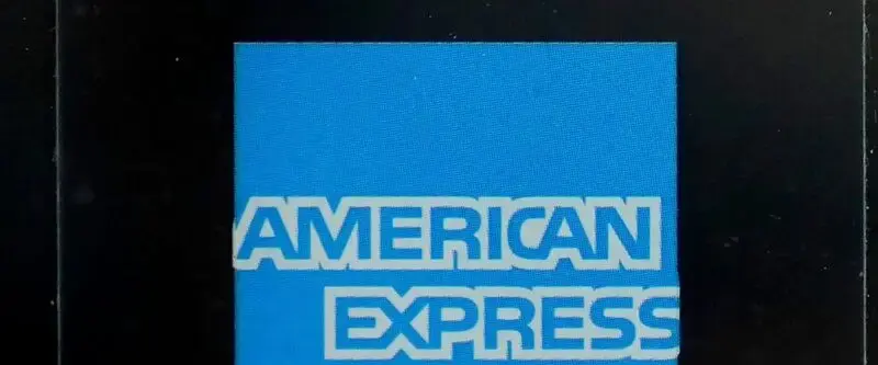 AmEx profits fall as higher spending offset by loan losses